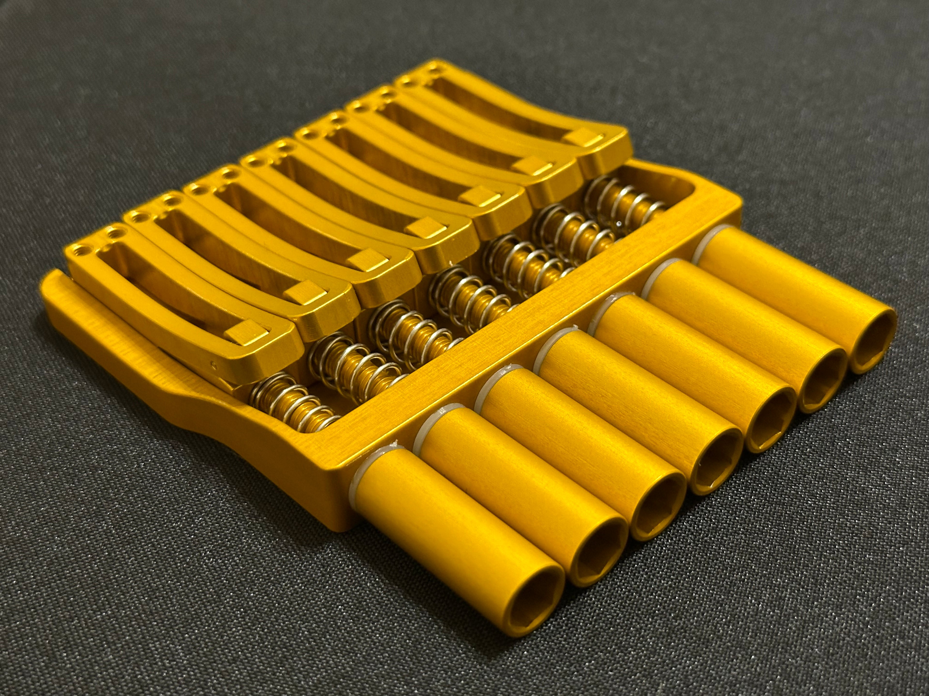 Rakhvari 7 String Hardtail Bridge - Gold Baseplate / Gold Hardware
