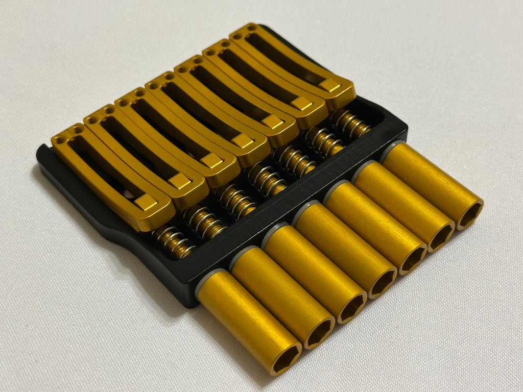 Rakhvari 7 String Hardtail Bridge - Black Baseplate / Gold Hardware