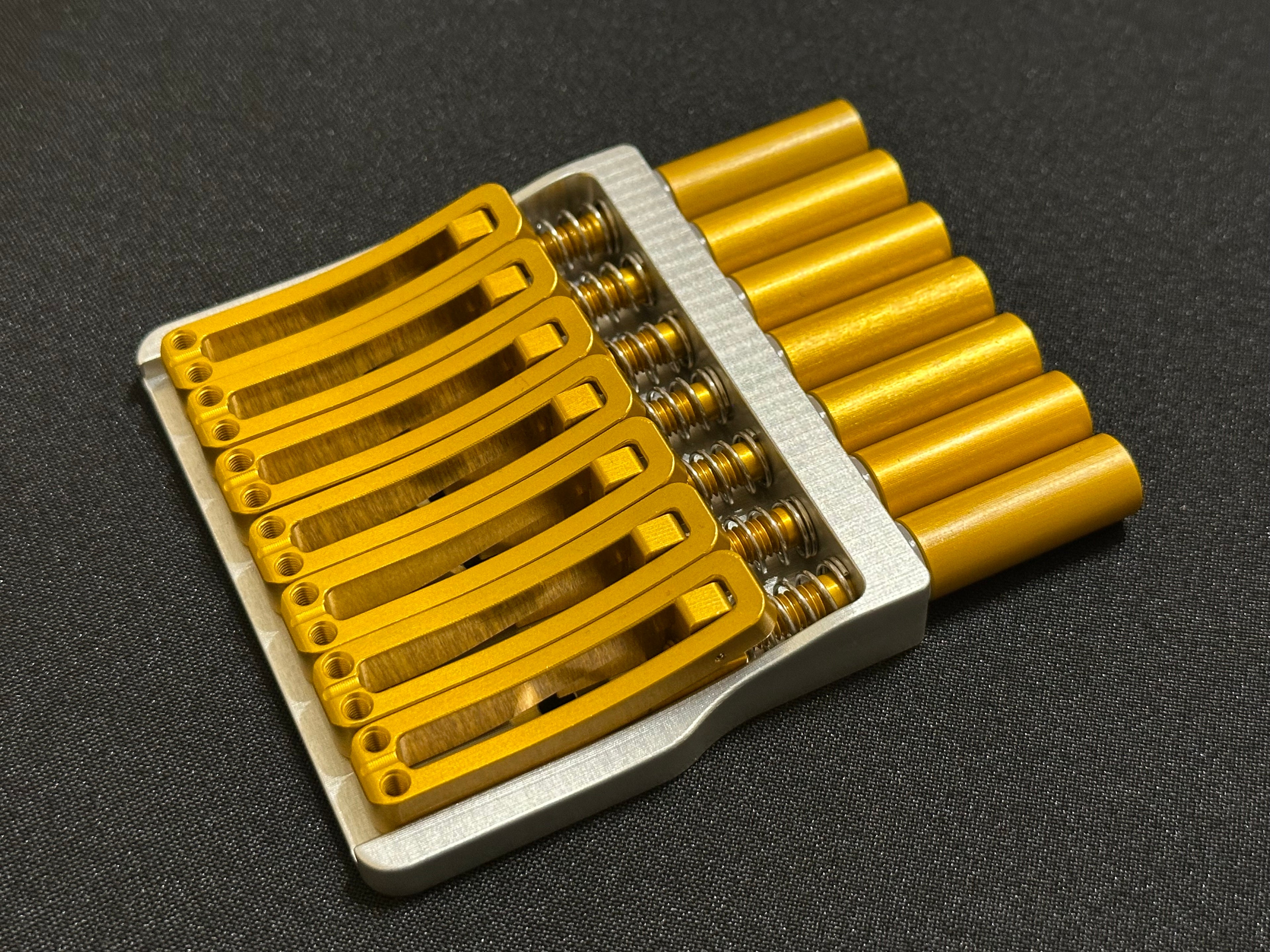 Rakhvari 7 String Hardtail Bridge - Silver Baseplate / Gold Hardware