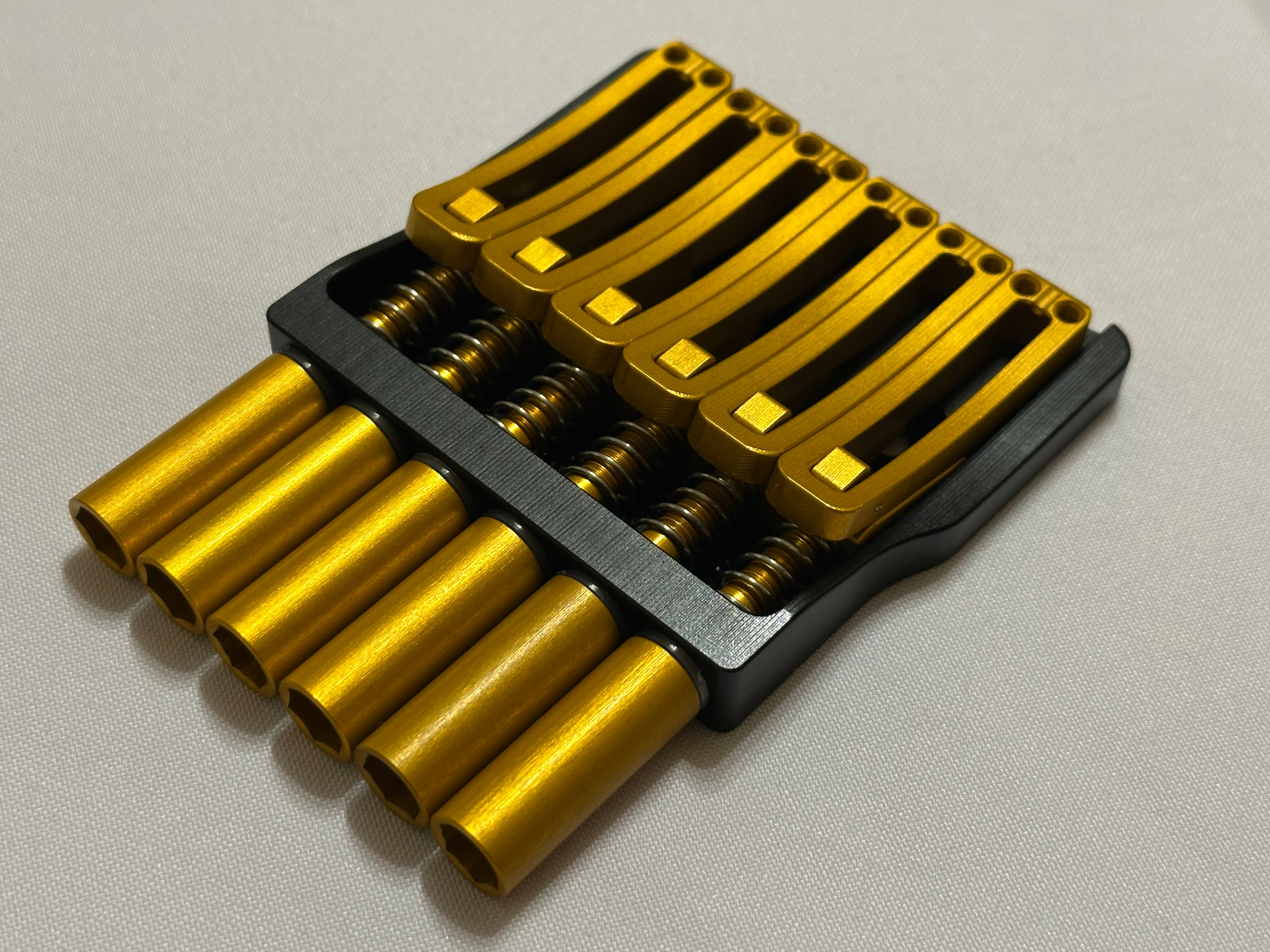 Rakhvari 6 String Hardtail Bridge - Black Baseplate / Gold Hardware