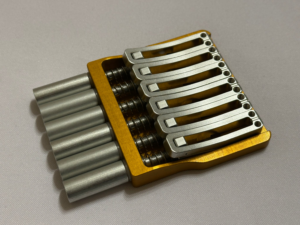 Rakhvari 6 String Hardtail Bridge - Gold Baseplate / Silver Hardware