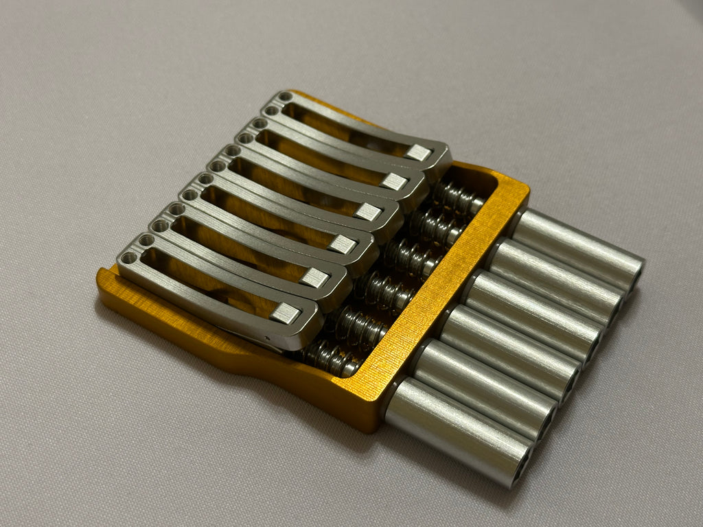 Rakhvari 6 String Hardtail Bridge - Gold Baseplate / Silver Hardware