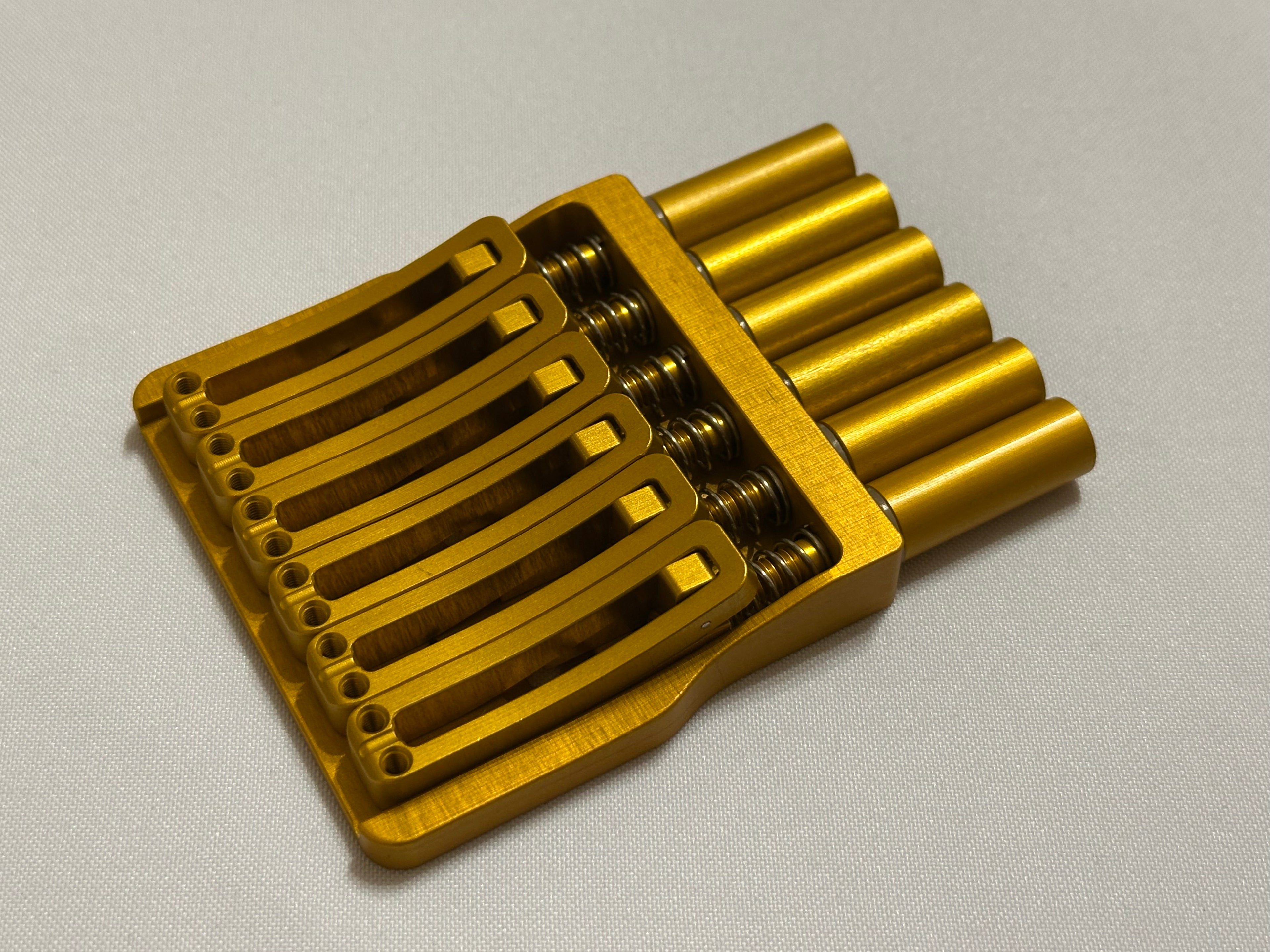 Rakhvari 6 String Hardtail Bridge - Gold Baseplate / Gold Hardware