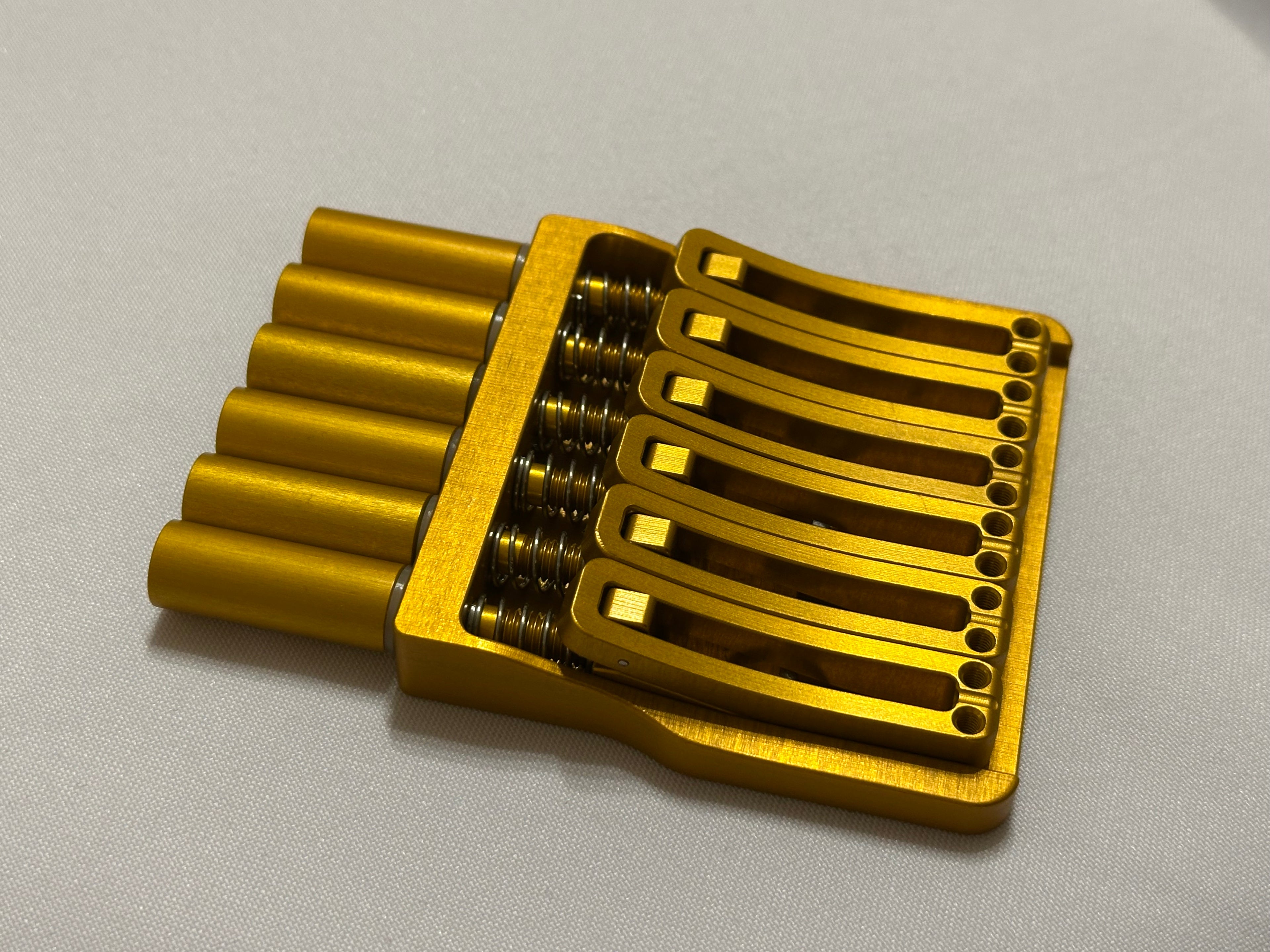 Rakhvari 6 String Hardtail Bridge - Gold Baseplate / Gold Hardware