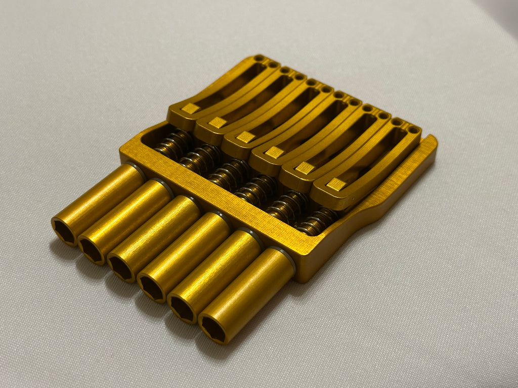 Rakhvari 6 String Hardtail Bridge - Gold Baseplate / Gold Hardware