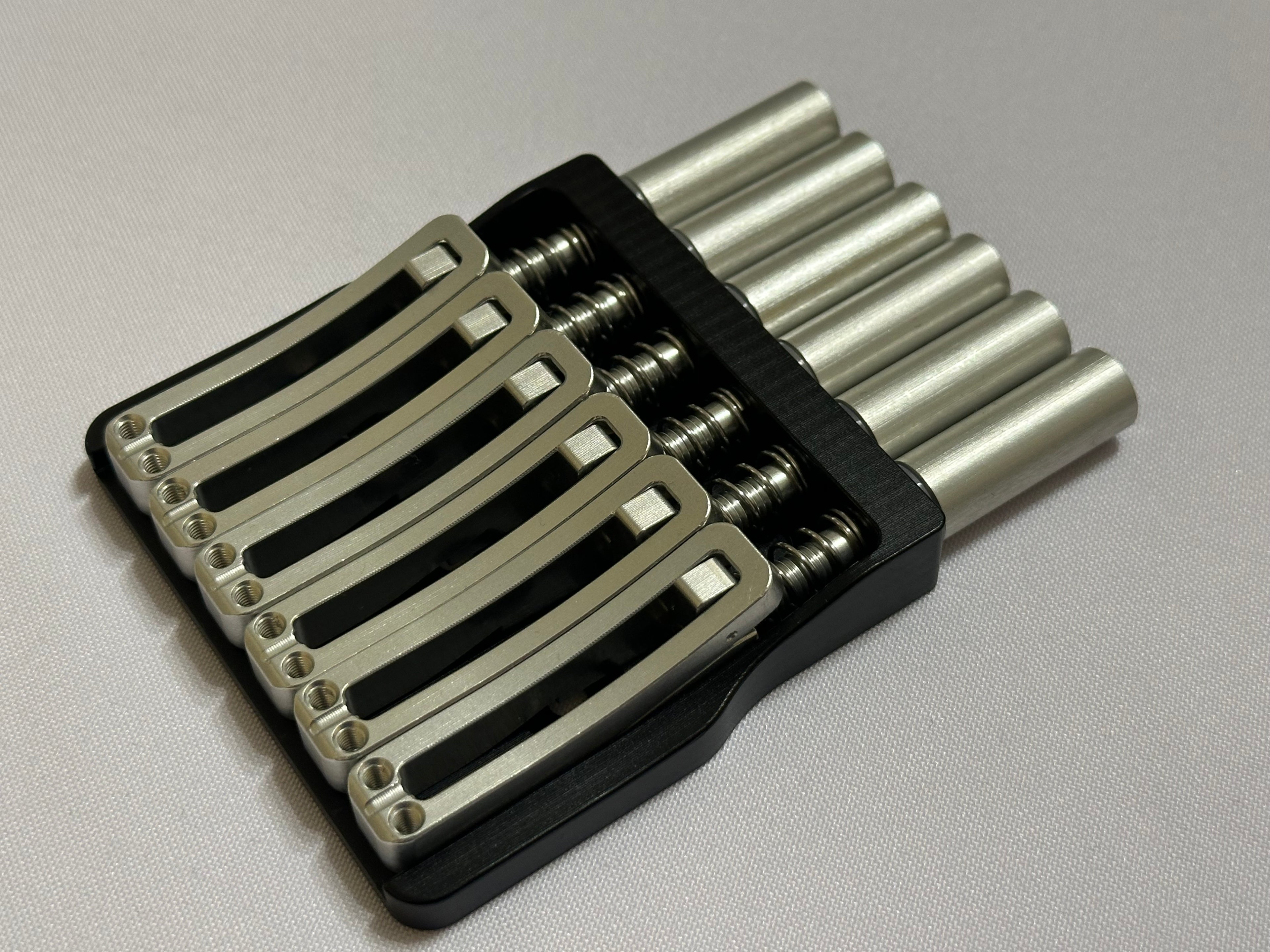 Rakhvari 6 String Hardtail Bridge - Black Baseplate / Silver Hardware