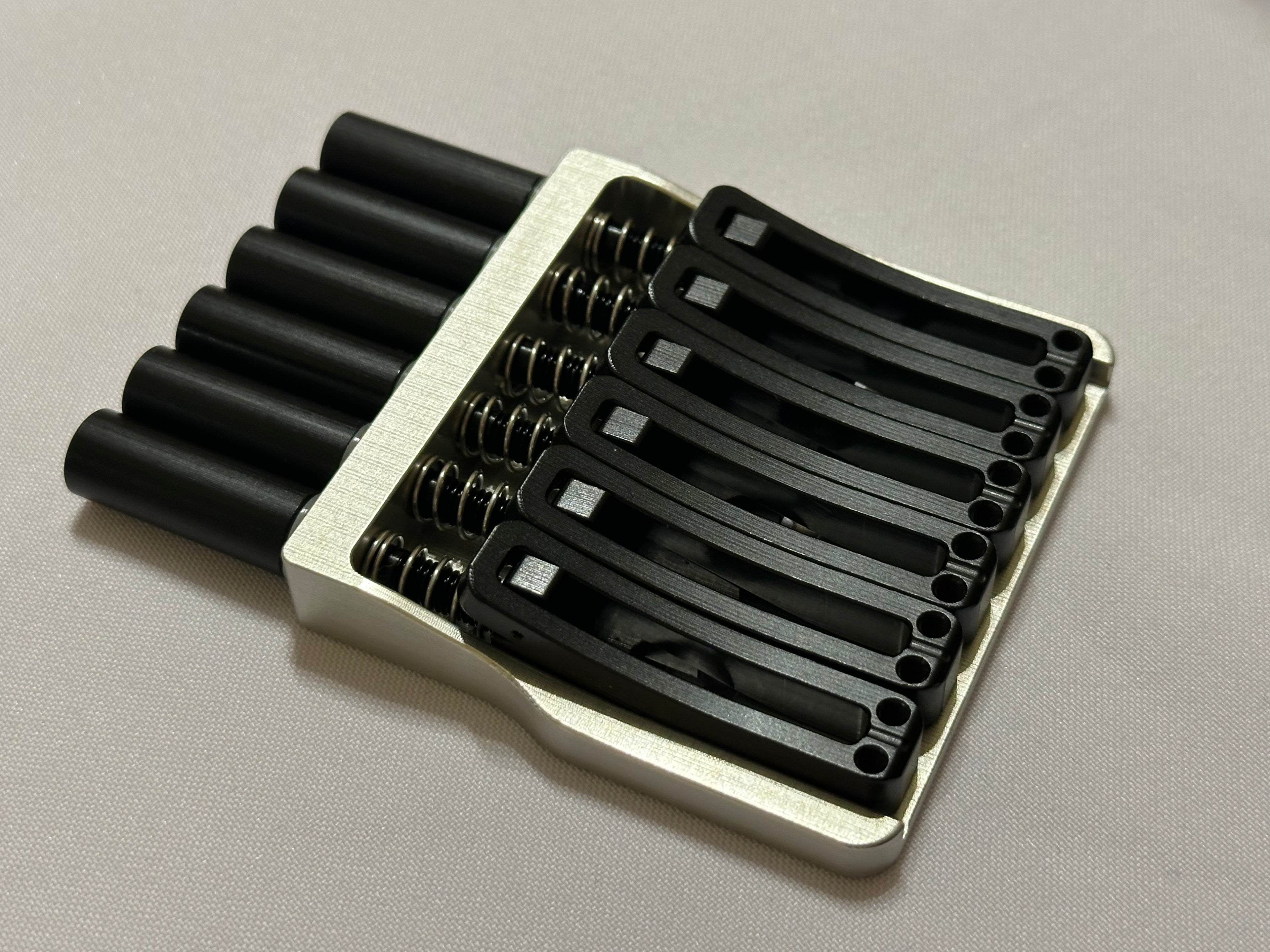 Rakhvari 6 String Hardtail Bridge - Silver Baseplate / Black Hardware