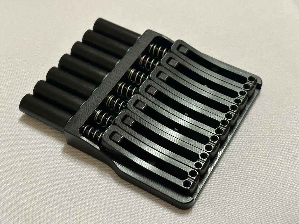 Rakhvari 7 String Hardtail Bridge - Gold Baseplate / Black Hardware