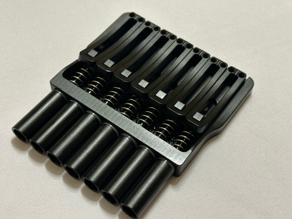 Rakhvari 7 String Hardtail Bridge - Gold Baseplate / Black Hardware