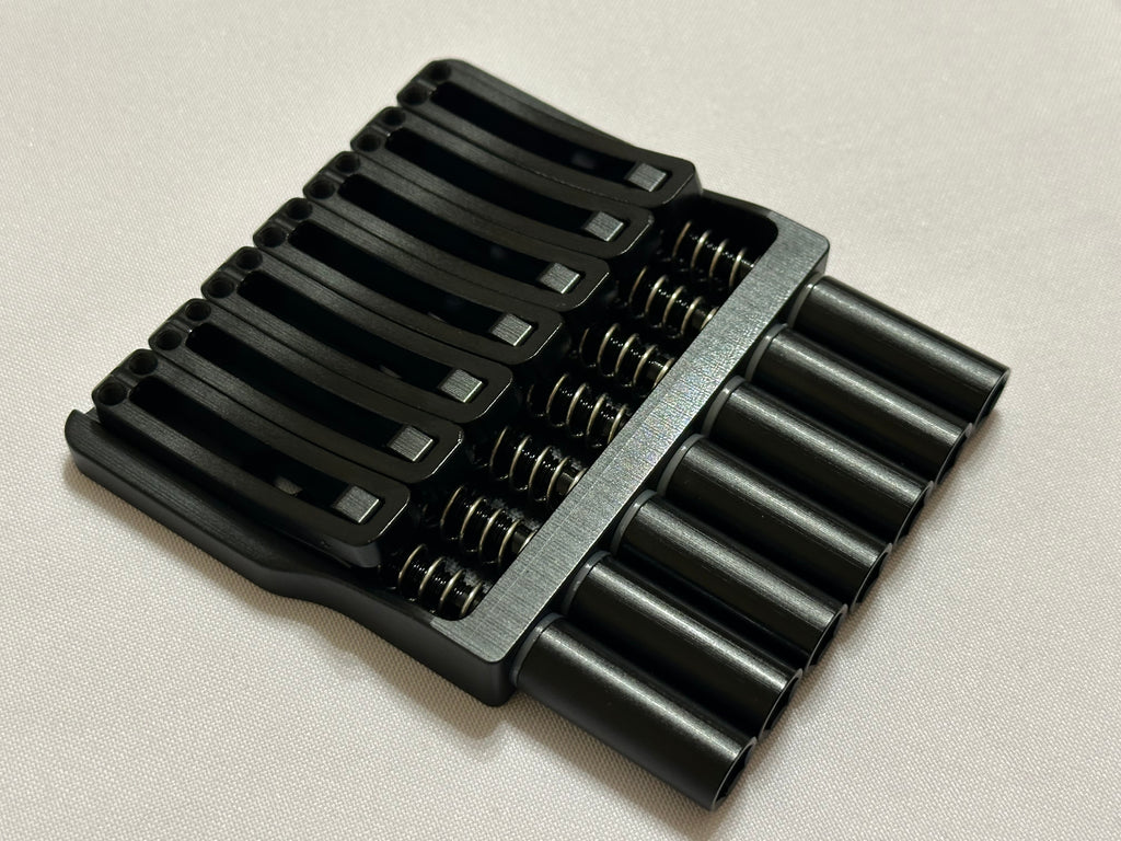 Rakhvari 7 String Hardtail Bridge - Gold Baseplate / Black Hardware