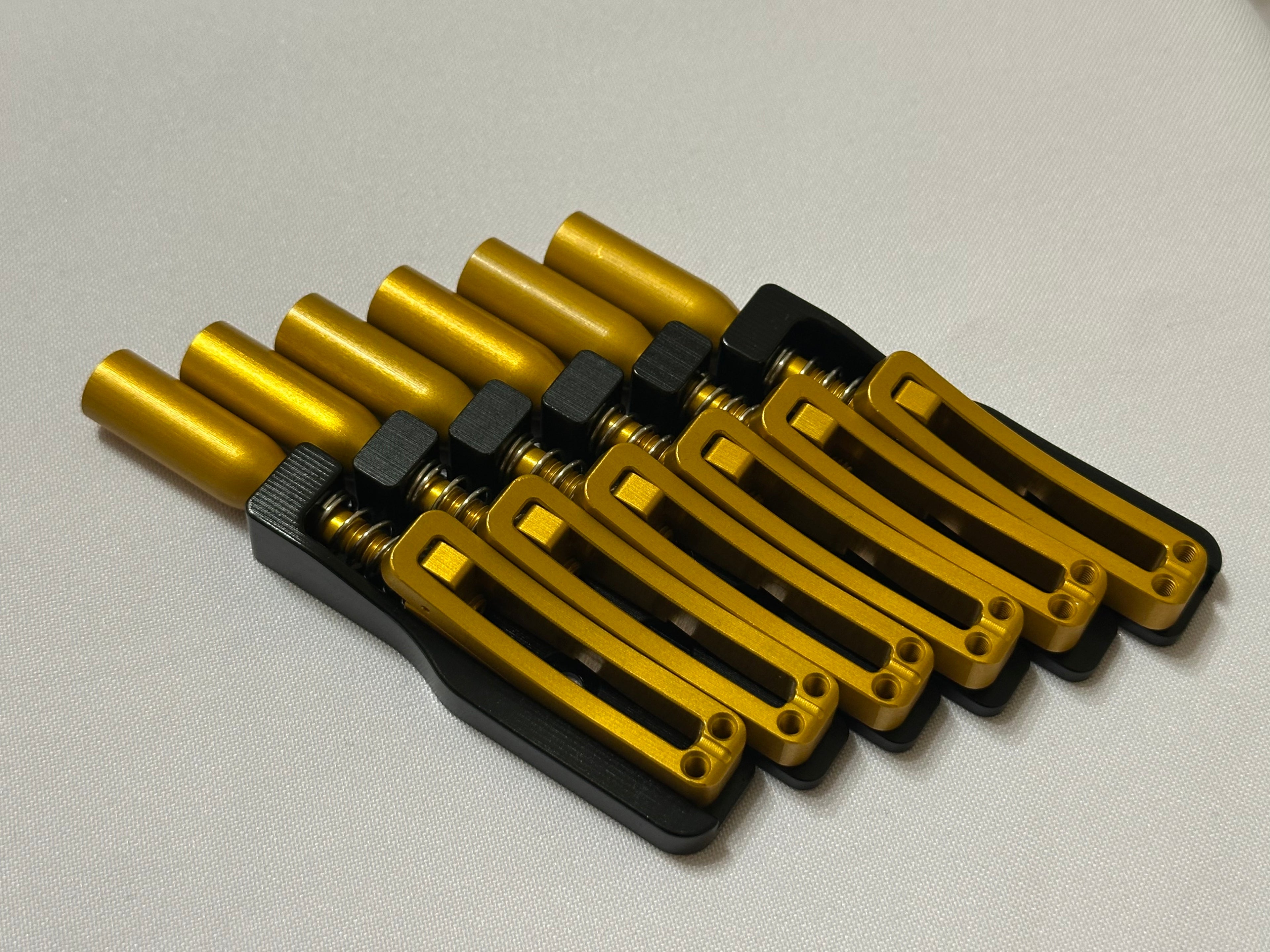 Skethra Multiscale Mono-Rail Bridge — Black Baseplate / Gold Hardware