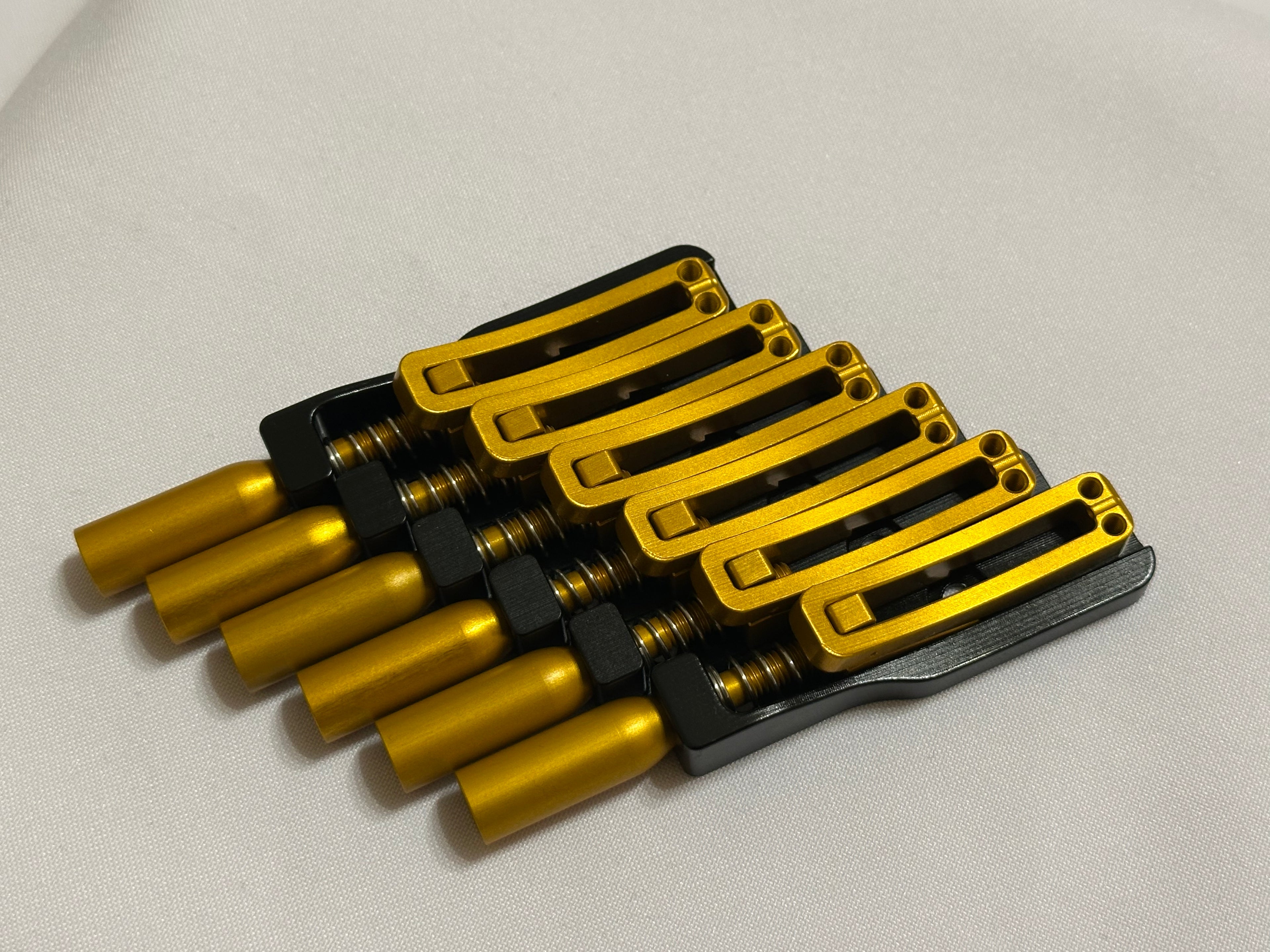 Skethra Multiscale Mono-Rail Bridge — Black Baseplate / Gold Hardware