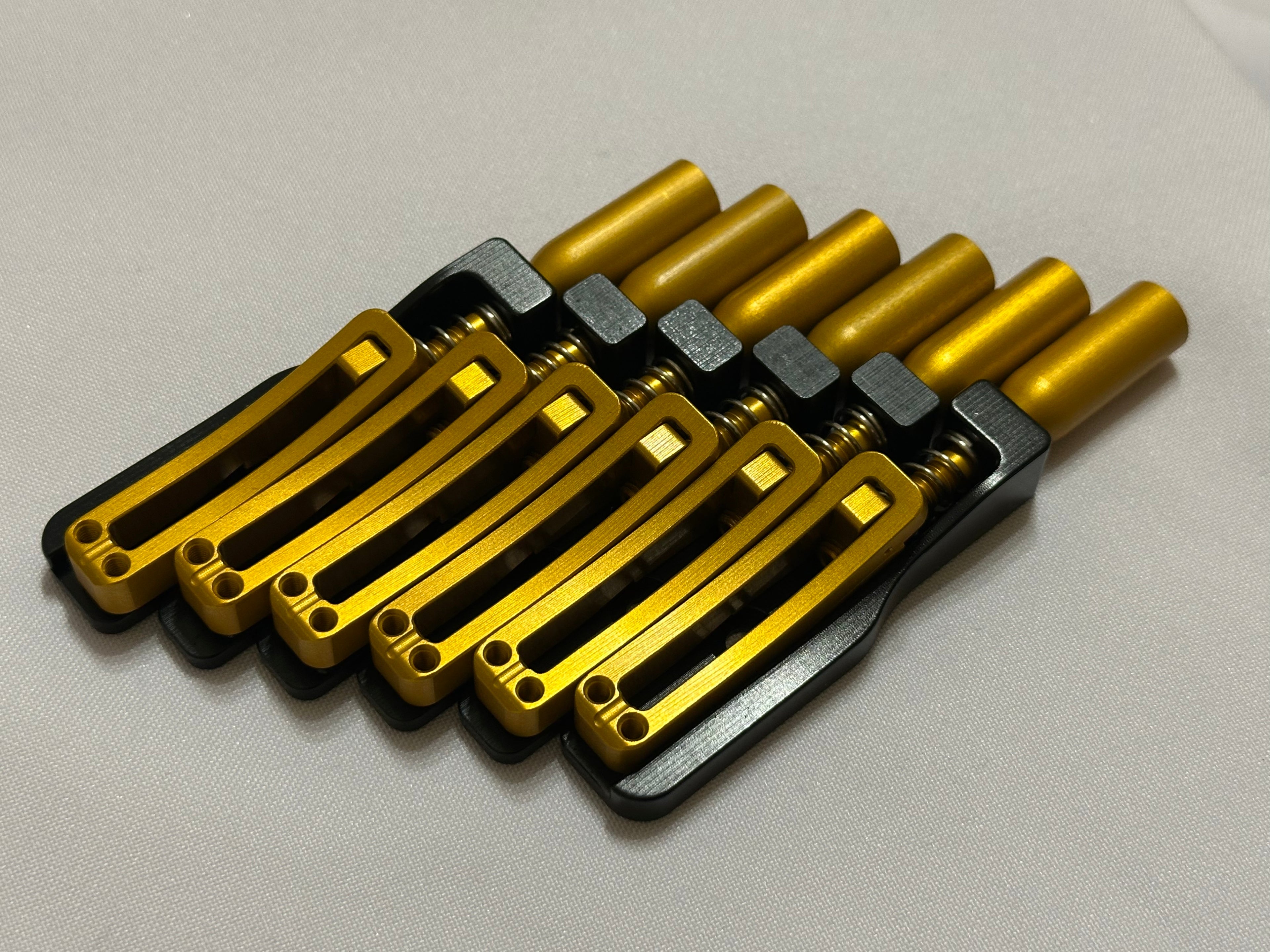 Skethra Multiscale Mono-Rail Bridge — Black Baseplate / Gold Hardware