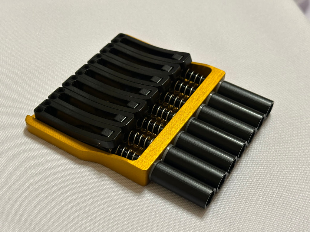 Rakhvari 8 String Hardtail Bridge - Gold Baseplate / Black Hardware