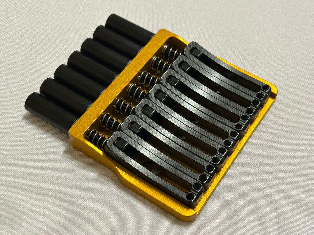 Rakhvari 8 String Hardtail Bridge - Gold Baseplate / Black Hardware