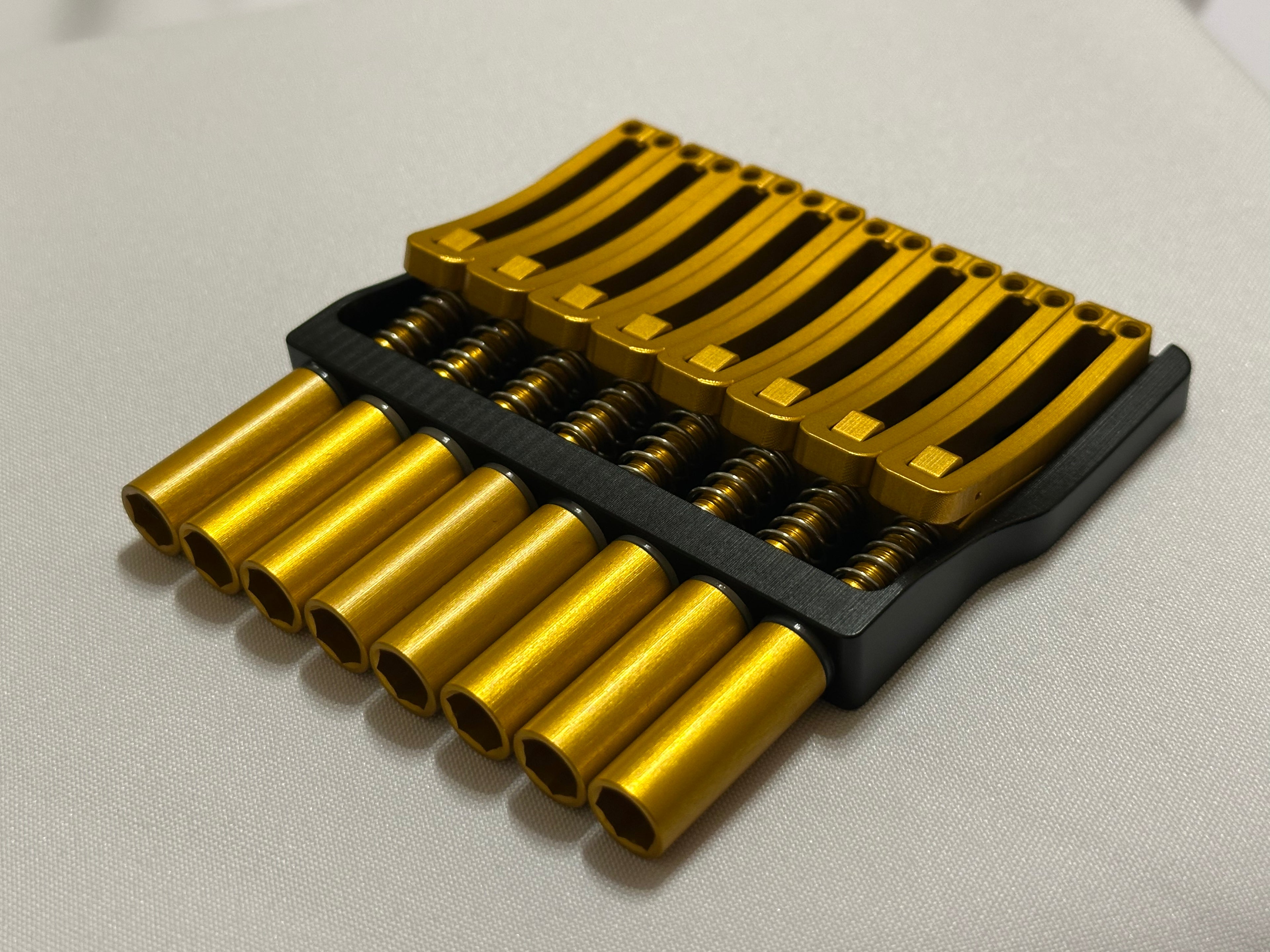 Rakhvari 8 String Hardtail Bridge - Black Baseplate / Gold Hardware