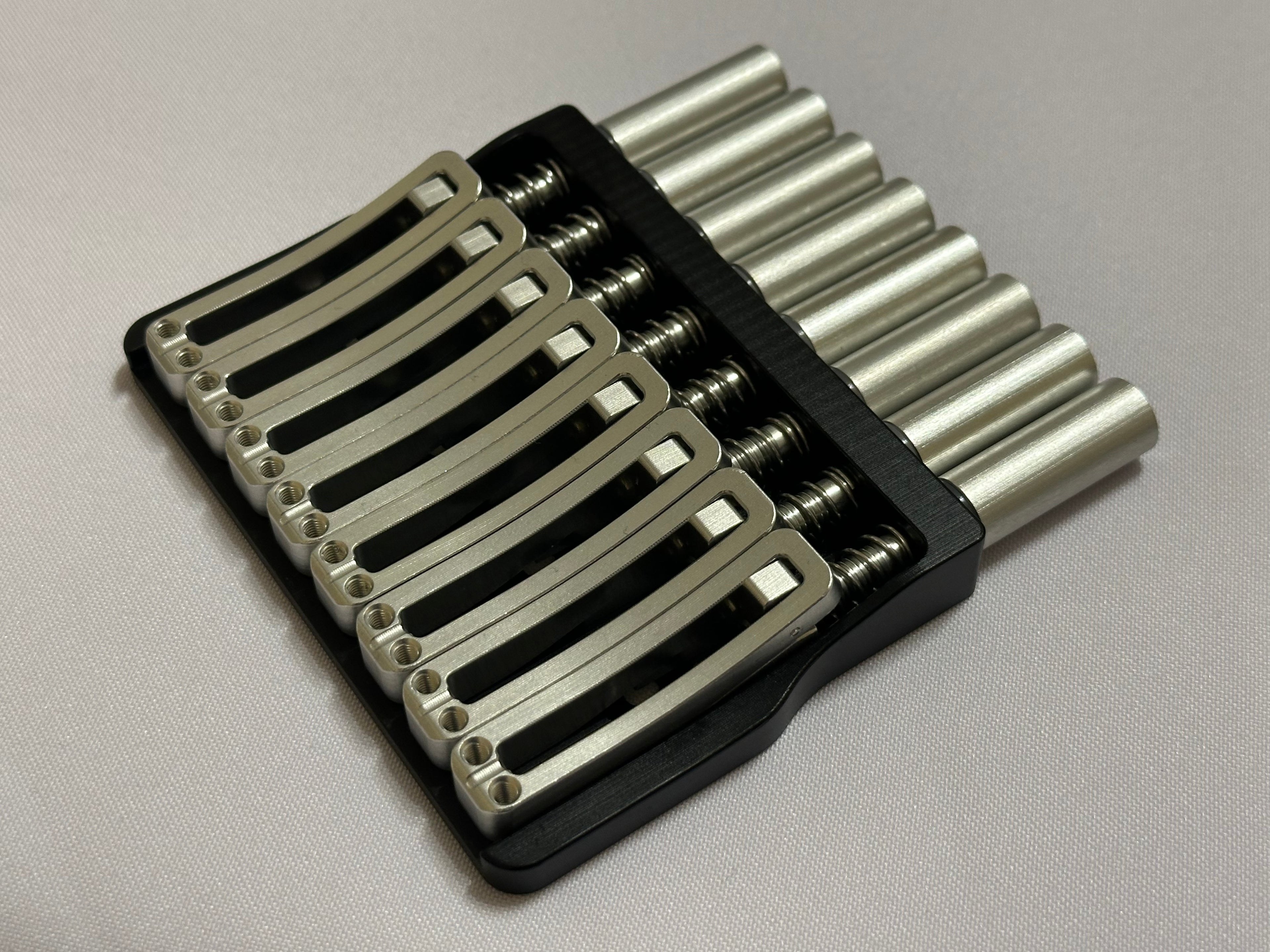 Rakhvari 8 String Hardtail Bridge - Black Baseplate / Silver Hardware
