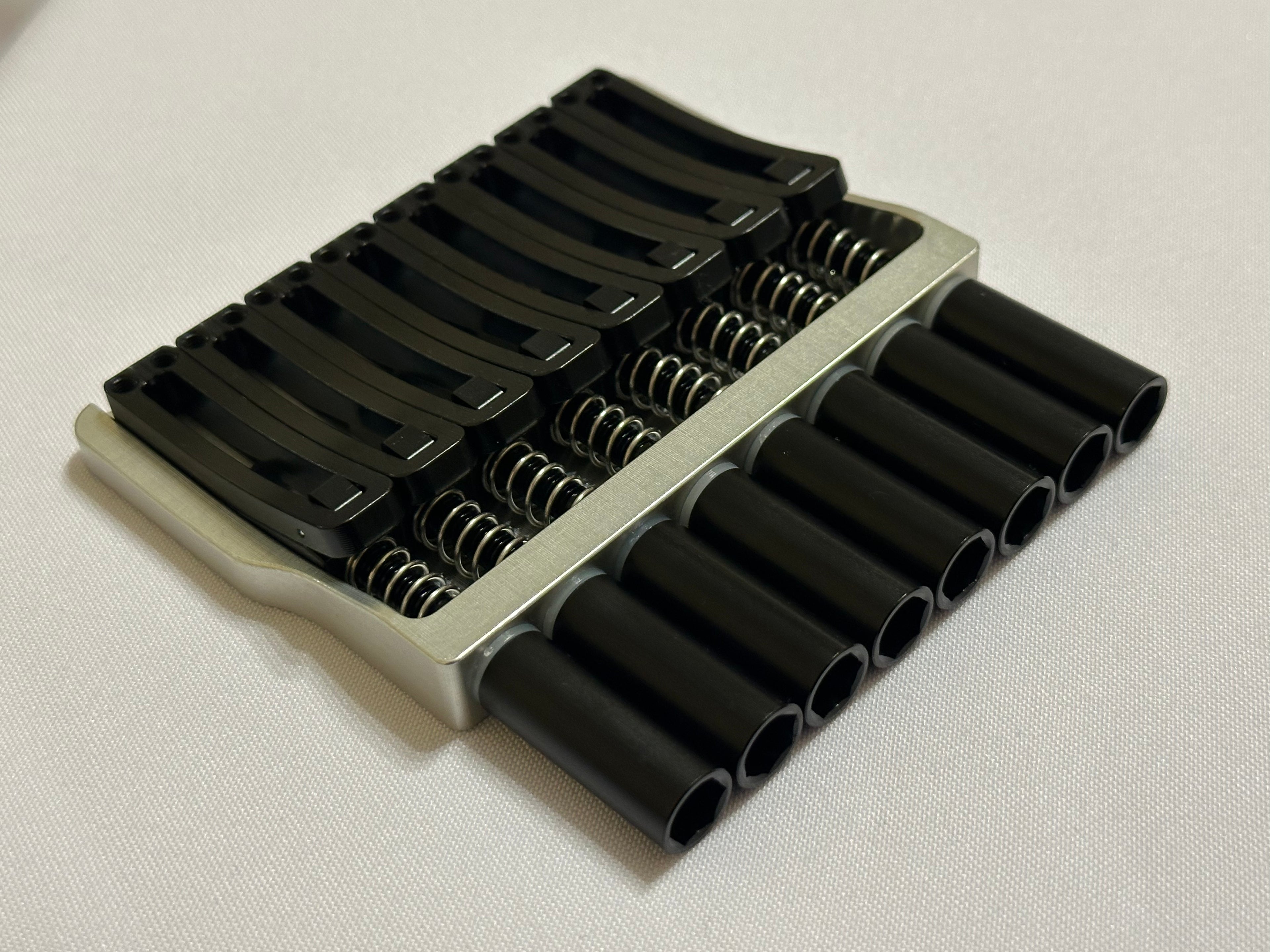 Rakhvari 8 String Hardtail Bridge - Silver Baseplate / Black Hardware