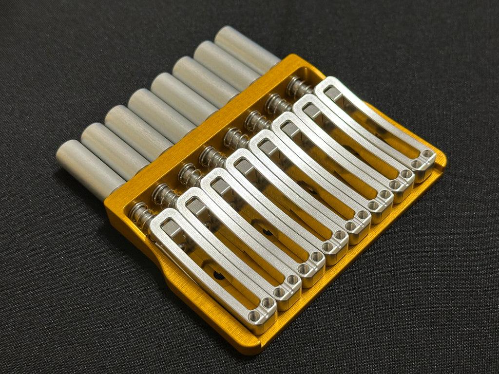 Rakhvari 8 String Hardtail Bridge - Gold Baseplate / Silver Hardware