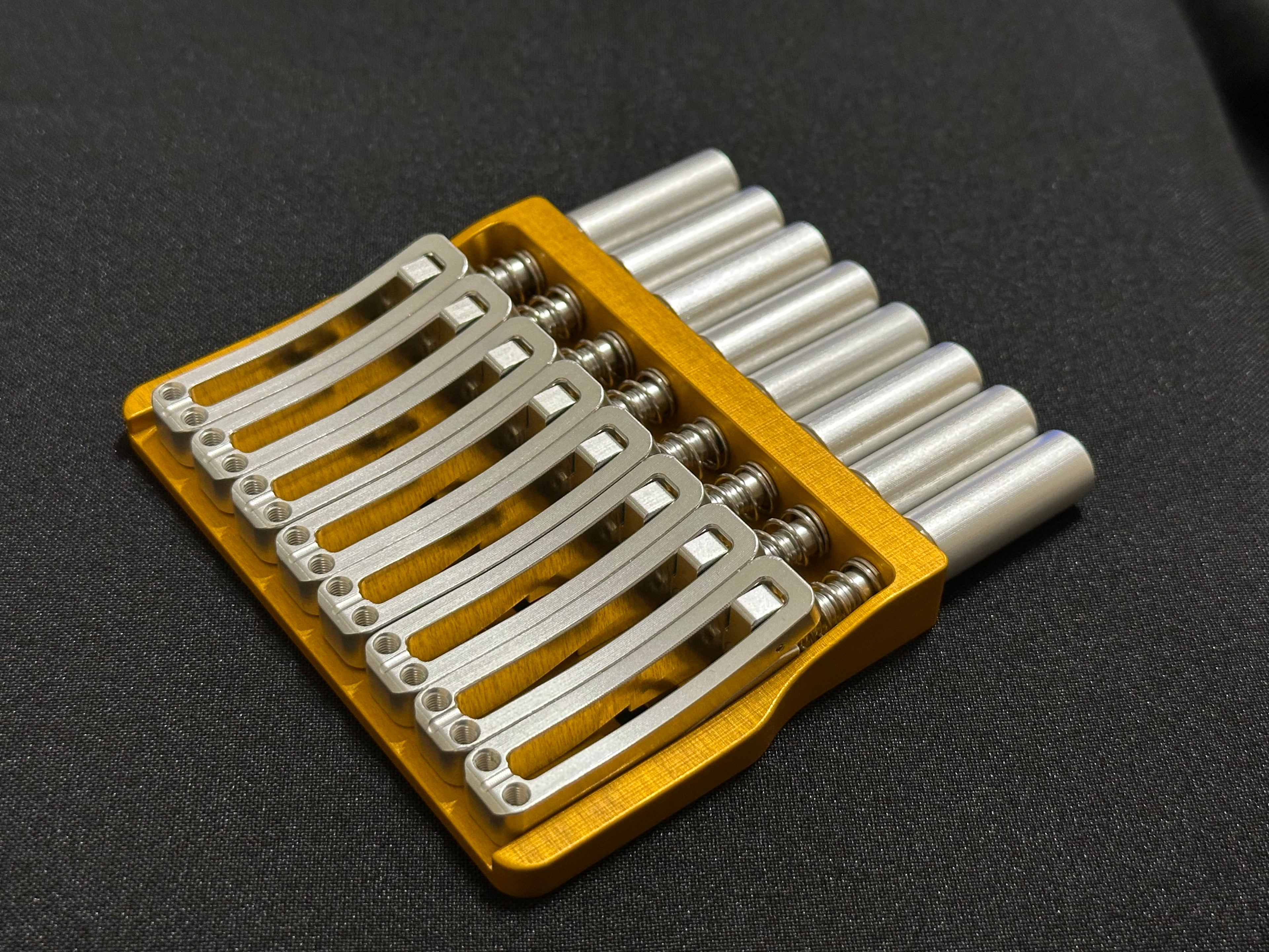 Rakhvari 8 String Hardtail Bridge - Gold Baseplate / Silver Hardware