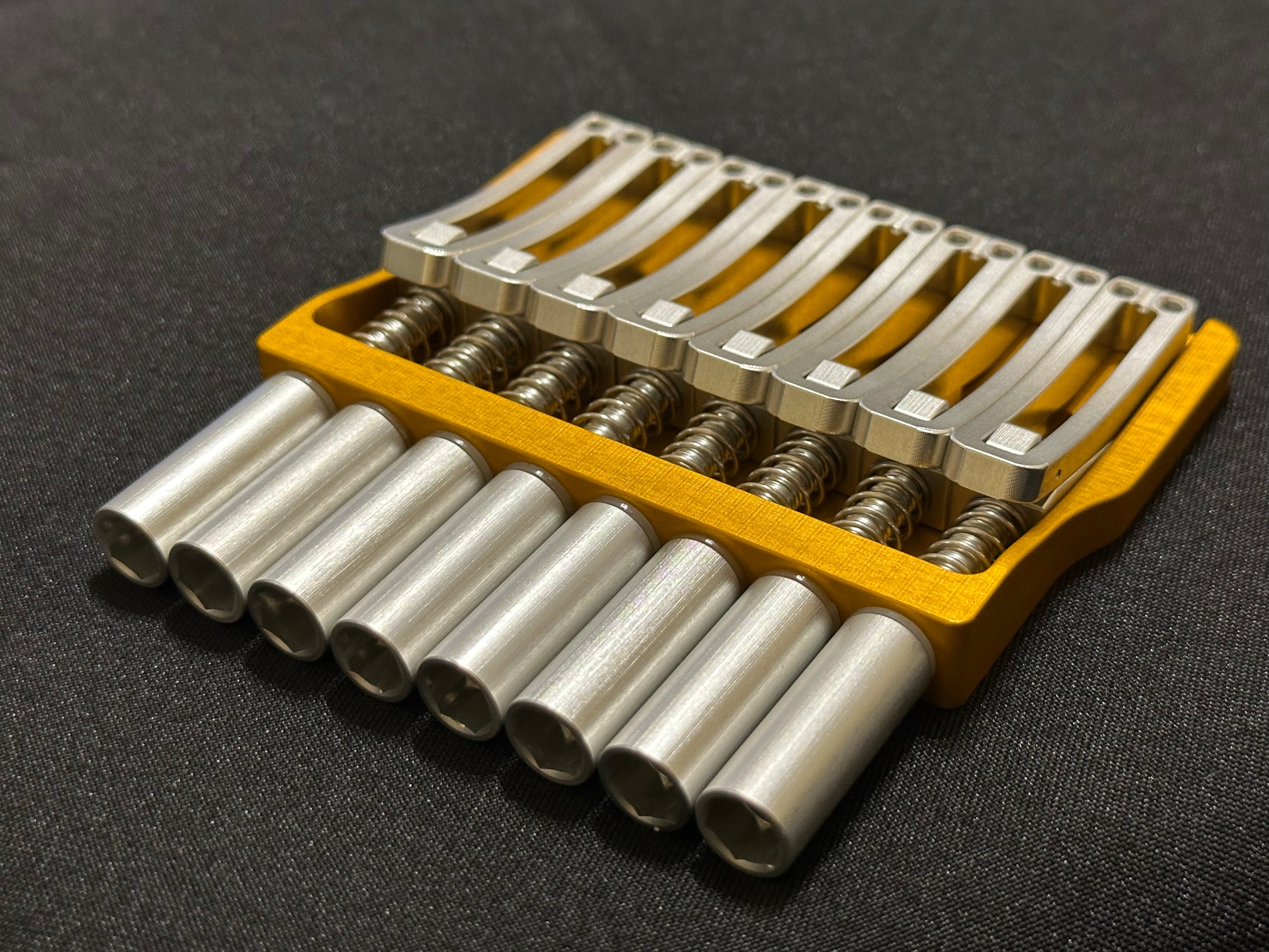 Rakhvari 8 String Hardtail Bridge - Gold Baseplate / Silver Hardware