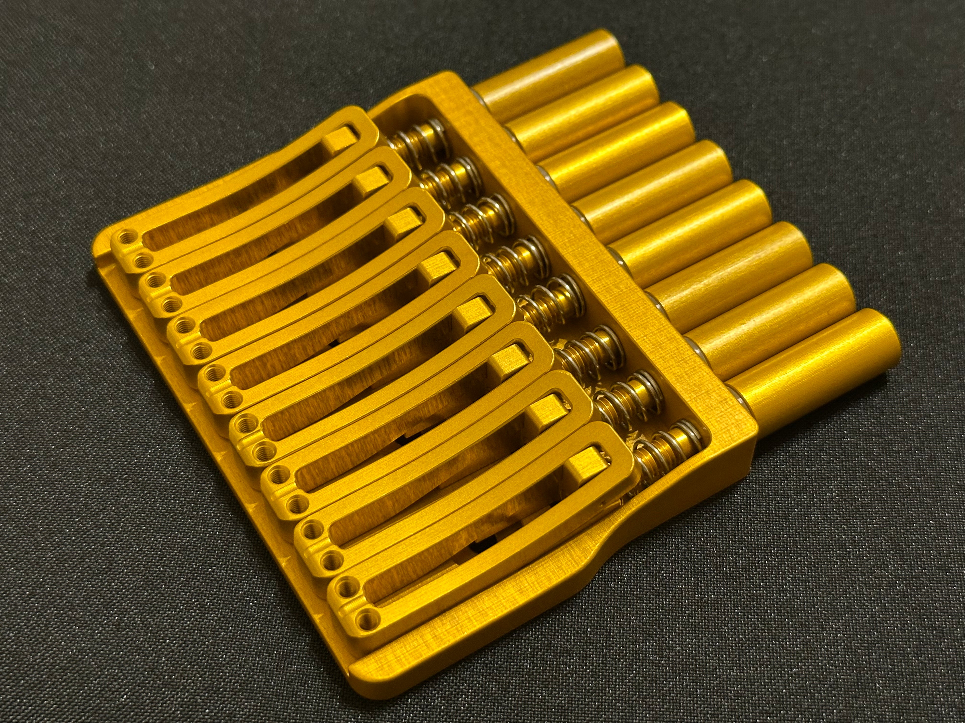 Rakhvari 8 String Hardtail Bridge - Gold Baseplate / Gold Hardware